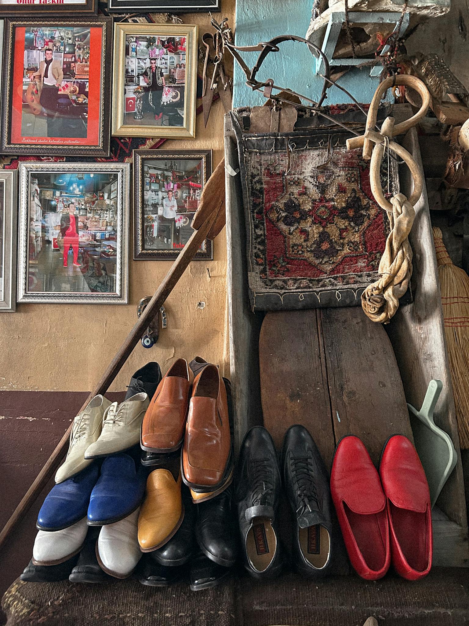 Colorful shoes stacked in a vintage Giresun shop, Türkiye. Nostalgic decor.